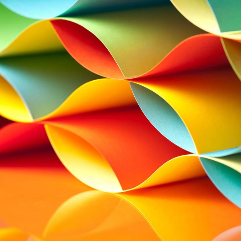 background macro image of colorful origami pattern made of curved sheets of paper, with mirror reflexion